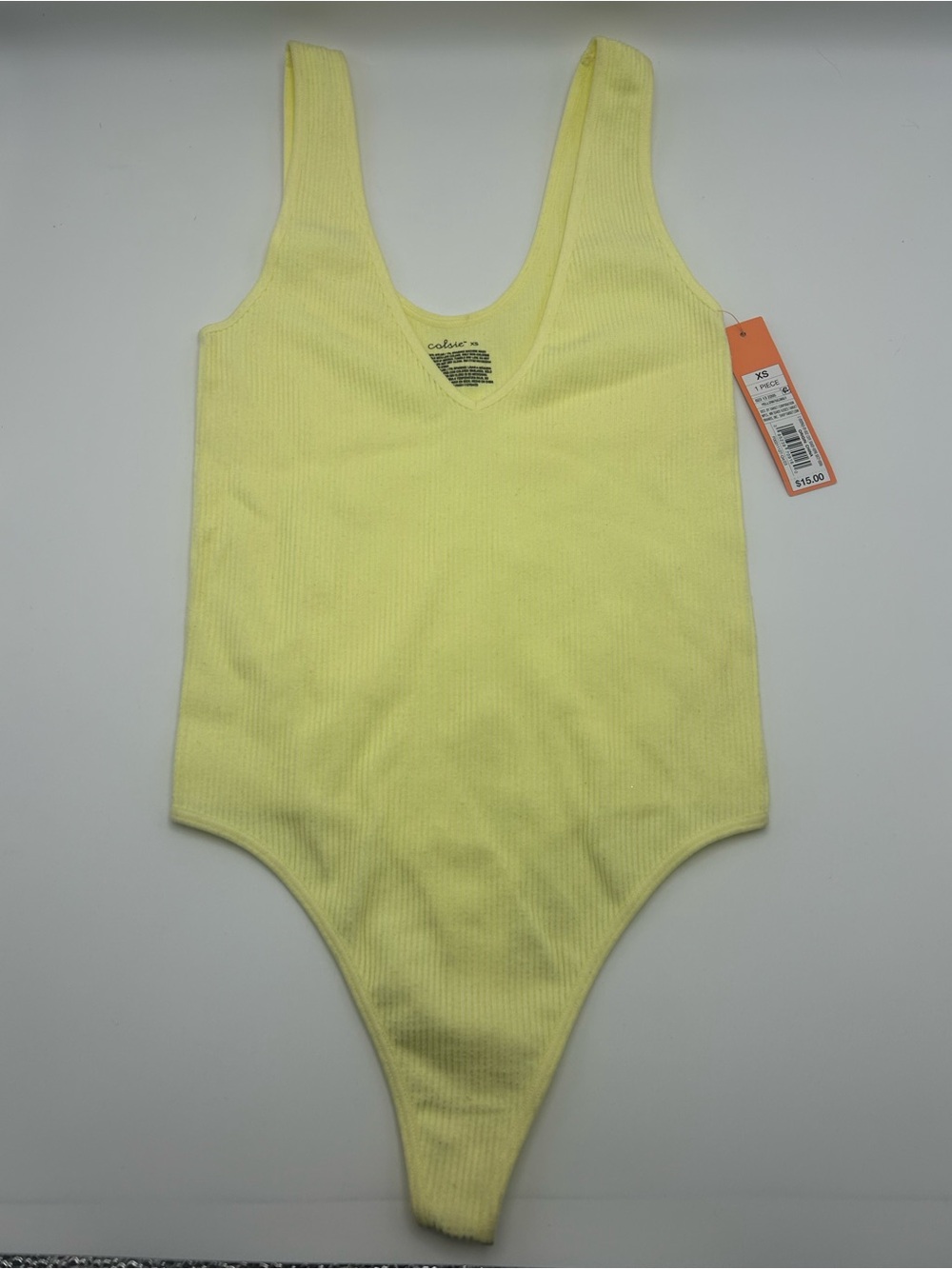 Colsie Yellow Ribbed V-Neck Tank One-Piece Bodysuit